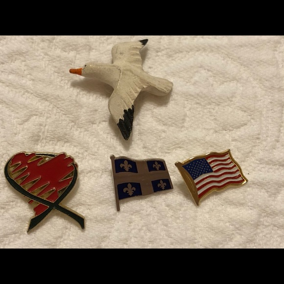 Jewelry - Assorted brooches flags, bird and heart.